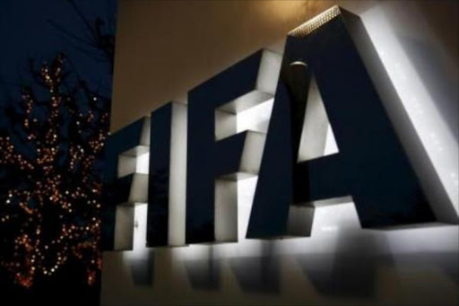 The FIFA logo is seen outside the FIFA headquarters in Zurich, Switzerland, December 17, 2015. /REUTERS