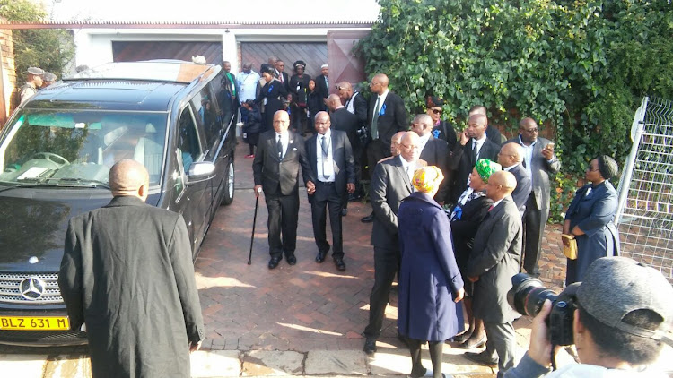 Andrew Mlangeni leaves Mama Winnie Madikizela Mandela's home in Soweto ahead of her funeral.