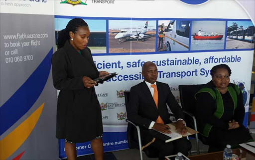 MAKING THE ANNOUNCEMENT: Fly Blu Crane airport operations head of department Stompie Tshesane talks about the new airline that will service the Mthatha to Johannesburg route from October 1 while airport committee chairman Anele Mbasane and transport MEC Weziwe Tikana listen on Picture: MKHULULI NDAMASE