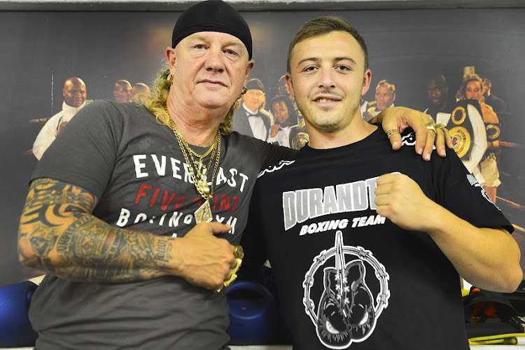 Boxing trainer and manager Nick Durandt and his eldest son Damien on March 16, 2016 in Johannesburg, South Africa.