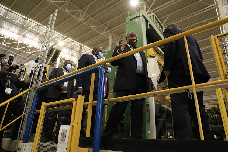 In the past three months SA has returned to growth levels last seen before the Covid-19 pandemic, says President Cyril Ramaphosa, seen here on a factory visit in May. File photo.
