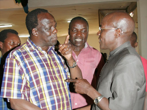 A file photo of Kakamega Governor Wycliffe Oparanya and Senator Boni Khalwale. /SAMUEL SIMITI