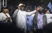 DRC President Felix Tshisekedi flanked by first lady Denise Nyakeru salutes supporters during at the Afia Stadium in Goma, North Kivu province, on December 10 2023. File photo.
