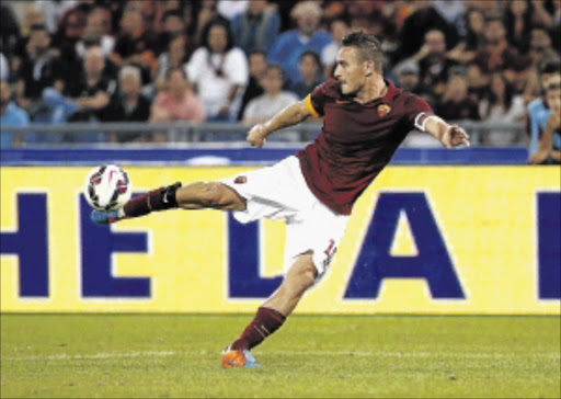 EVERGREEN: AS Roma's Francesco Totti has scored three goals so far this season and provided four assists photo: Tony Gentile/REUTERS