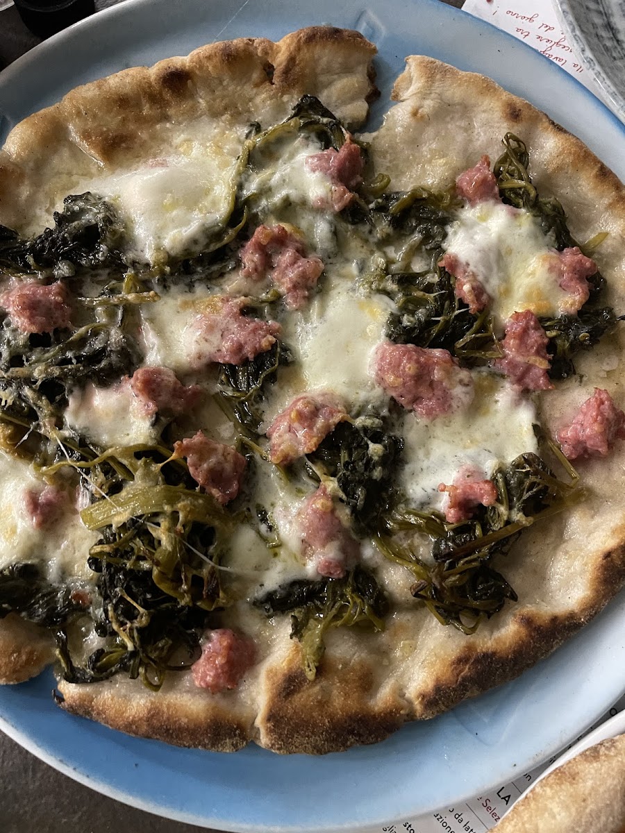 Sausage & broccoli rabe. Best white pizza of my life. Perfection.