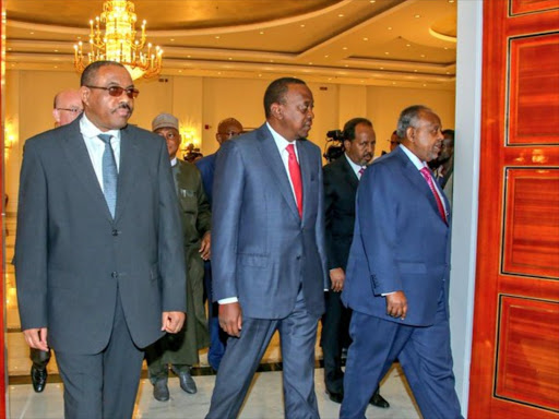 President Uhuru Kenyatta (c) in Djibouti during a summit for countries that have contributed troops to the African Union Mission in Somalia, February 28, 2016. Photo/PSCU