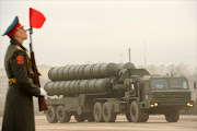 A Russian surface-to-air missile system S-300 PMU2 Favorit rolls during a rehearsal of the Victory Day Parade in Alabino, outside Moscow, on April 18, 2012.