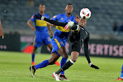 Tendai Ndoro of Orlando Pirates and Thato Mokeke of Cape Town City during the Absa Premiership match between Orlando Pirates and Cape Town City at Orlando Stadium on September 20, 2016 in Soweto, South Africa.