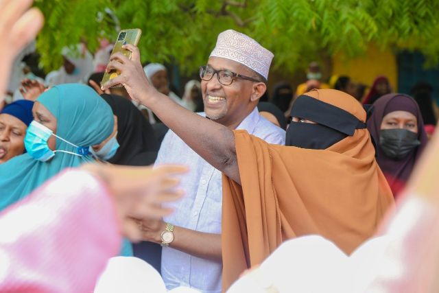 Garissa Township MP Aden Duale takes a selfie with his constituents at AP Goodwish Mixed Day Primary School in Garissa.