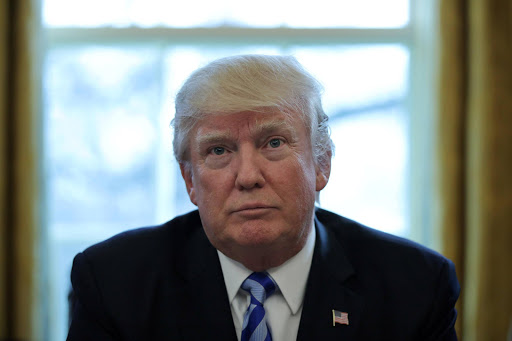 U.S. President Donald Trump talks to journalists at the Oval Office of the White House after the AHCA health care bill was pulled before a vote in Washington, U.S. REUTERS/Carlos Barria