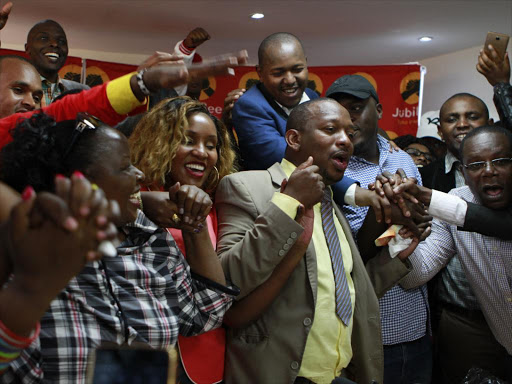 Senator Mike Sonko celebrates with members of Team Nairobi after presenting his nomination papers at Jubilee headquarters. /MONICAH MWANGI