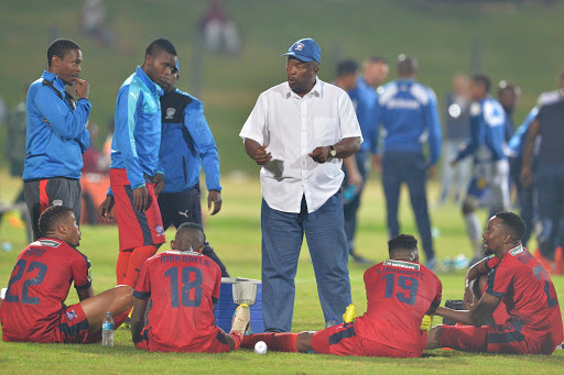 Jomo Sono speaks to Bamuza Sono during the Nedbank Cup last 16 match between Jomo Cosmos and Bidvest Wits at Tsakane Stadium on April 04, 2017 in Johannesburg, South Africa.