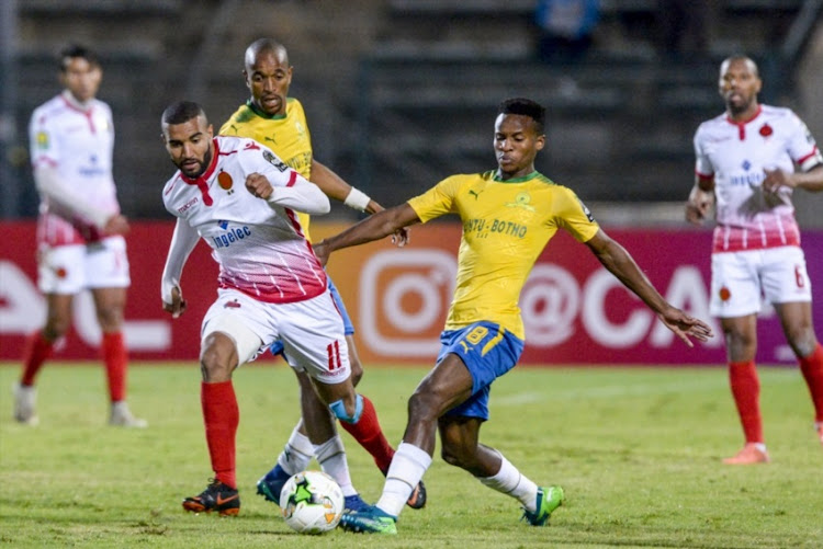 Ismail el Haddad of Wydad Athletic and Themba Zwane of Mamelodi Sundowns during the CAF Champions League match between Mamelodi Sundowns and Wydad Athletic Club.