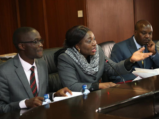BELEAGUERED: IEBC boss Ezra Chiloba, vice chairperson Lilian Bokeeye Mahiri-Zaja and commissioner Thomas Letangule when they appeared before Parliament’s Justice and Legal committee on August 18, 2015.Photo/Hezron Njoroge