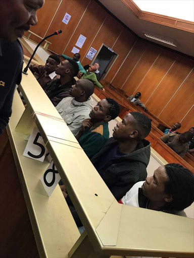 Kismo Jonase, Wilson Moyo, Bony Dube, Admax Moyeni, Petros Mzimba and Simon Titina in the East London Regional Court yesterday. Picture: ZWANGA MUKHUTHU