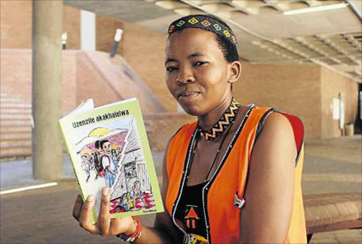 PROUD OF HER ROOTS: WSU lecturer Yoliswa Madolo has contributed to preserving, protecting and promoting vernacular languages with the launch of her debut Xhosa novel ‘Uzenzile Akakhalelwa’ in Mthatha Picture: SUPPLIED