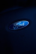 Ford Logo on a steering wheel Picture: free stock image