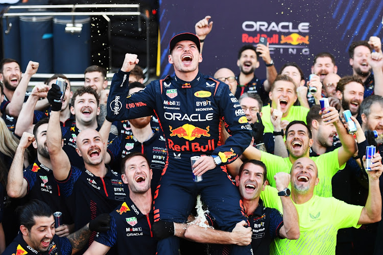 Race winner Max Verstappen of Oracle Red Bull Racing celebrates with his team after the F1 Grand Prix of Brazil on Sunday in São Paulo. Picture: RUDY CAREZZEVOLI / GETTY IMAGES