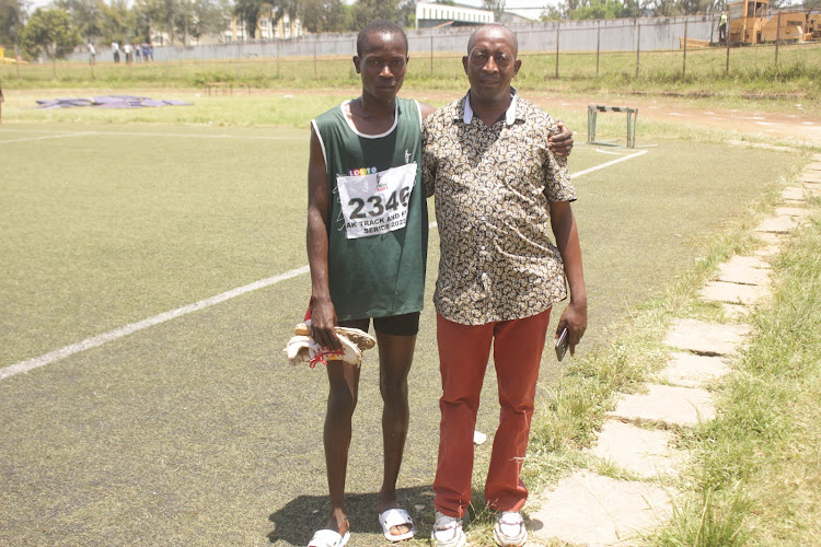 Upcoming athlete Rickywarren Gwako poses for a photo with his father Julius Gwako, who is a former athlete