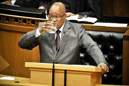President Jacob Zuma takes a sip of water as he addresses the National Assembly. File photo.