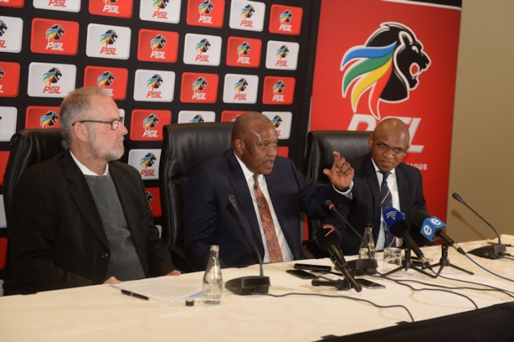 PSL head of legal division,Michael Murphy,PSL Chairperson Dr Irvin Khoza and PSL media officer and Lux September during the National Soccer League Board of Governors Press Conference at Sandton Convention Centre on July 12, 2018 in Johannesburg, South Africa.