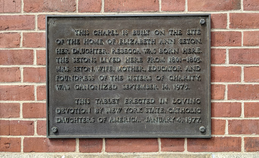 THIS CHAPEL IS BUILT ON THE SITE OF THE HOME OF ELIZABETH ANN SETON. HER DAUGHTER, REBECCA WAS BORN HERE, THE SETONS LIVED HERE FROM 1801-1803 MRS. SETON, WIFE, MOTHER, EDUCATOR AND FOUNDRESS OF...