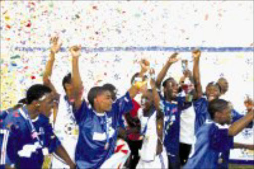 VICTORIOUS: Gauteng provincial team celebrates after winning 4-3 against North West during the Safa -Metropolitan U-19 Championships at Seshego Stadium. Pic. Tladi Khuele. 19/04/2008. © Bochabela