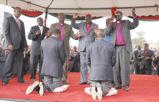SEEKING DIVINE INTERVENTION: Pastors pray for president Uhuru Kenyatta and deputy William Ruto at Ruiru stadium ahead of the ICC cases. ‘Church leaders have condemned the entire Muslim community as terrorists, and shown no respect for their religion. The same leaders earlier held numerous prayer sessions for the dismissal of the cases against Uhuru and Ruto before the ICC (presum- ably regardless of the facts), and gave them the use of prayer sessions to lobby their congregations for their cause.’