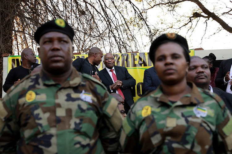 Former president Jacob Zuma, surrounded by his allies, addressed a crowd of supporters after his first day of evidence at the judicial commission of inquiry into state capture in Parktown, Johannesburg, July 15 2019
