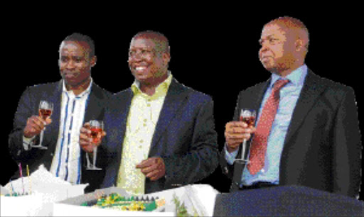 03 MARCH 2010 WEDNESDAY: From left, Clifford Motsepe, HOD of Department of Local Government and Housing, Julius Malema, ANCYL president and the Limpopo premier Cassel Mathale toast during Malema birthday party held at Seshego Stadium on Wednesday. Pic: ELIJAR MUSHIANA. 03/03/2010. © SOWETAN