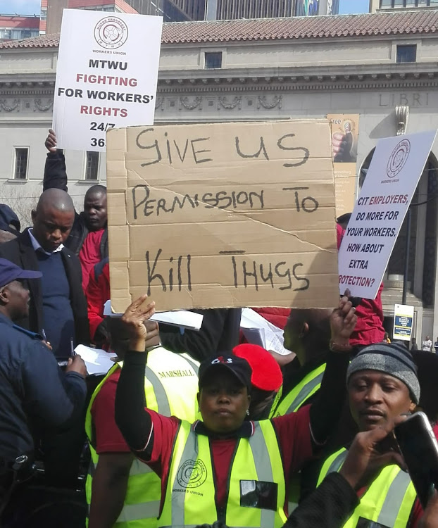Cash-in-transit guards embarked on a peaceful march over recent heists on Tuesday.