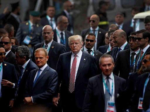 US President Donald Trump walks during the G7 summit in Taormina, Sicily, Italy, May 26, 2017. /REUTERS