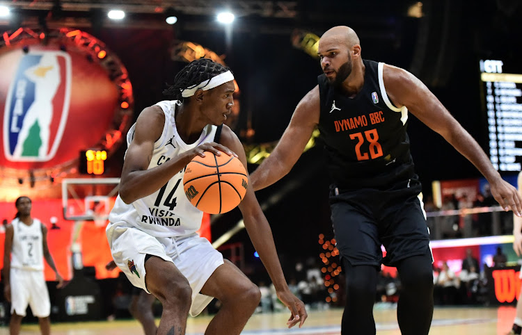 Nkosinathi Sibanyoni of Cape Town Tigers is challenged by Morakinyo Williams of Dynamo BBC during the 2024 BAL Season 4 match at the SunBet Arena in Pretoria on Saturday. The ‘Visit Rwanda’ logo is visible on Sibayoni’s apparel and has been blacked out on Williams’s.