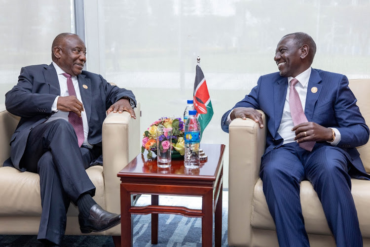 President William Ruto with his South Africa counterpart Cyril Ramaphosa at the African Union headquarters during the 37th Ordinary Session of the Assembly of Heads of State and Government in Addis Ababa, Ethiopia on February 18, 2024