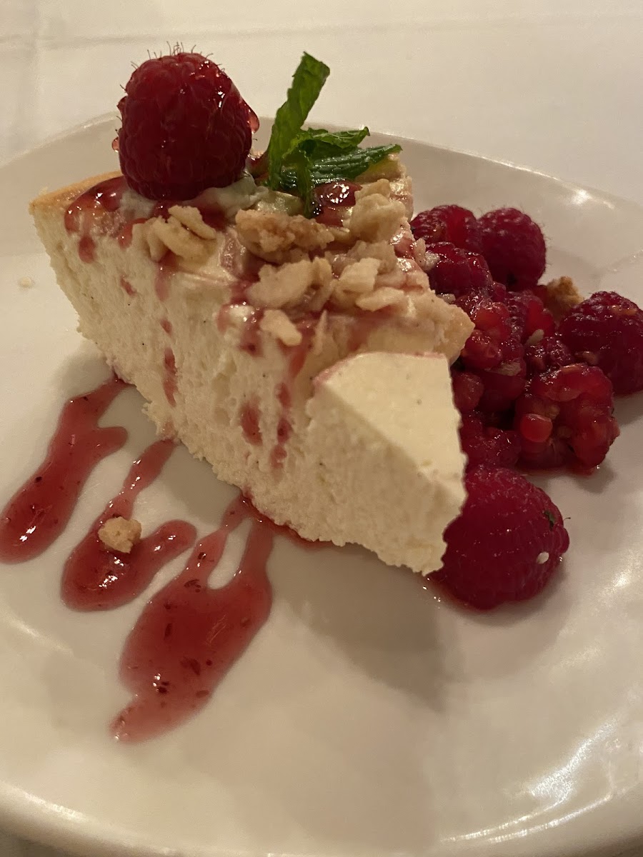 Ricotta cheesecake with almond crumble and raspberry