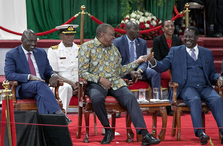 President Uhuru Kenyatta, Deputy President William Ruto and Raila Odinga during the launch of the Building Bridges Initiative report at Bomas of Kenya, Nairobi, on November 27, 2019