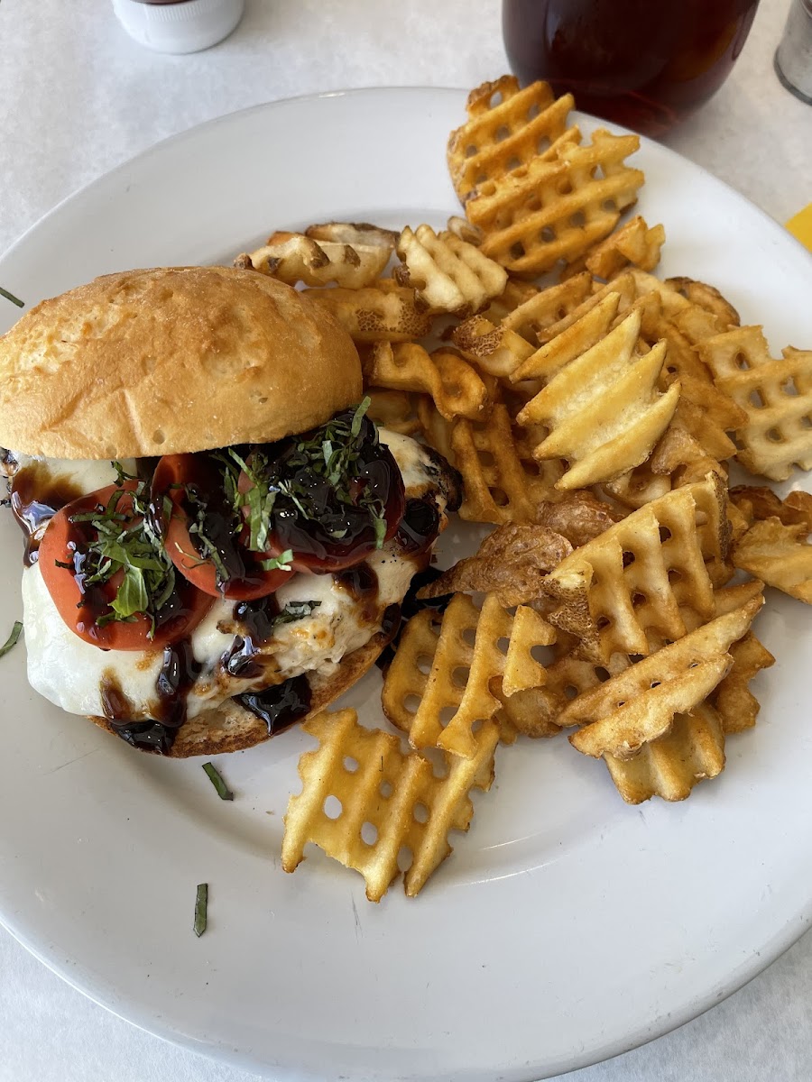 Caprese chicken sandwich with waffle fries