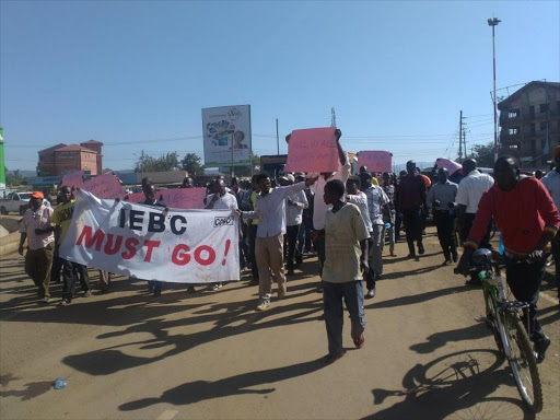Youths hold peaceful demonstrations in Kondele, Kisumu, for the removal of IEBC commissioners ahead of the August 2017 general election, May 8, 2016. Photo/COURTESY