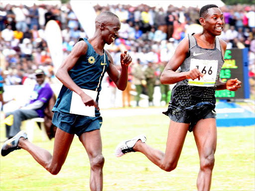 Ezekiel Kemboi with Conceslus Kipruto in 3,000m steeplechase compete during Athletics trials for Rio 2016 Olympic Games in July. /enos teche