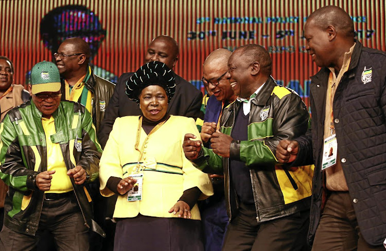 ANC president Jacob Zuma and his deputy Cyril Ramaphosa dance with Nkosazana Dlamini-Zuma at the end of the ANC National Policy Conference that was held at Nasrec, Johannesburg.