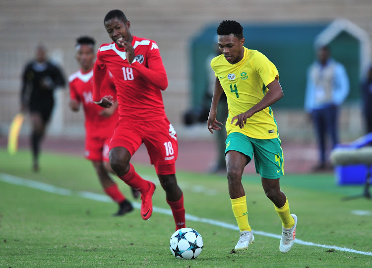 Gift Neo Links of South Africa gets away from Vitapi Ngaruka of Namibia during the Cosafa Cup semifinal match at Old Peter Mokaba Stadium, Polokwane on June 5 2018.