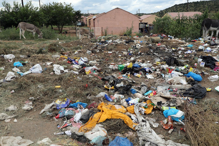 The garbage pileup makes for a stinky condition that reaches the inside of homes in Wedela in the Merafong municipality.