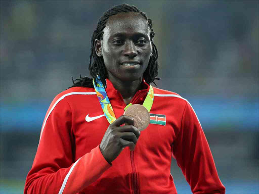 Margaret Nyairera Wambui (KEN) of Kenya poses with her bronze medal. REUTERS/Stoyan Nenov