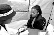 JUST A PRICK: Tshidi Mholo is one of the personalities who took an HIV test publicly yesterday. Pic. Vathiswa Ruselo. 18/09/08. © Sowetan.