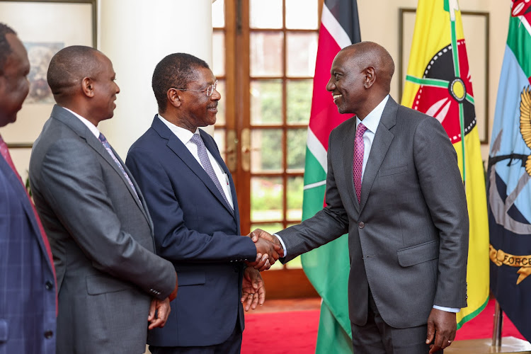 President William Ruto with National Assembly Speaker Moses Wetang'ula and Leader of Majority Kimani Ichung'wah at State House, Nairobi on December 11, 2023