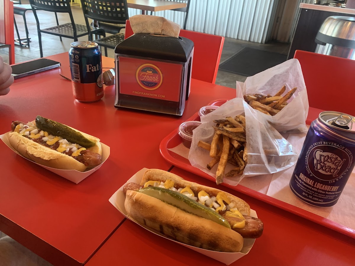 The hot dog on the right has a gluten free bun