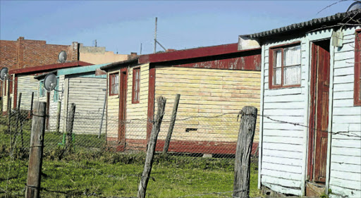 TO BE REPLACED: Buffalo City Metro is fast tracking the process of building houses for residents of Ilitha township , whose wooden houses build by the Ciskei homeland government are in a state of decay. Picture: BONGANI FUZILE