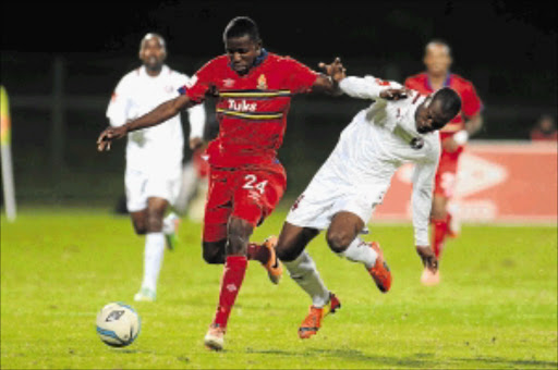 TUKKING IN: Ronald Ketjijere of Tuks and Asavela Mbekile of Swallows during the Absa Premiership at Tuks Stadium on TuesdayPhoto: Lefty Shivambu/Gallo Images