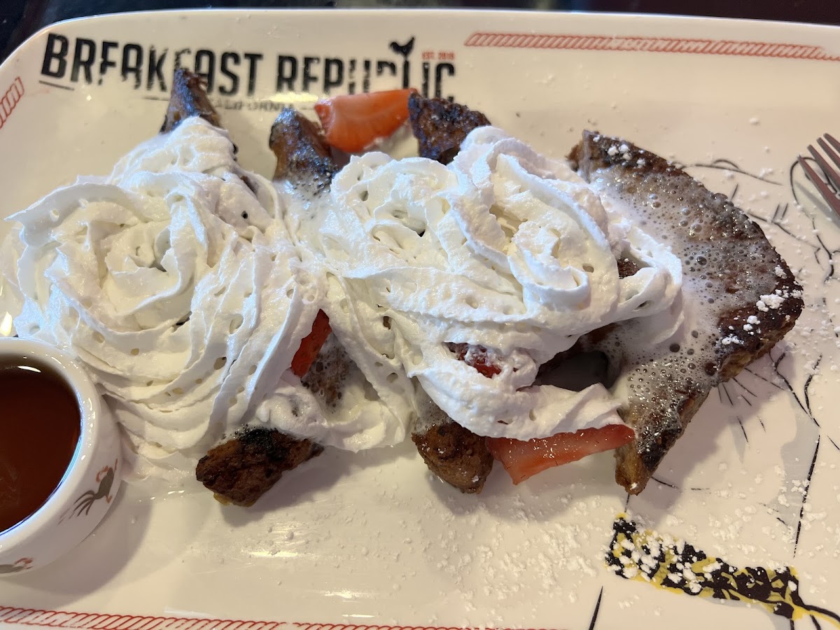 Cinnamon Raisin French Toast witb berries and cream