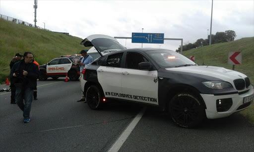 A K9 tactical enforcement vehicle at the scene of the N1 hijacking.